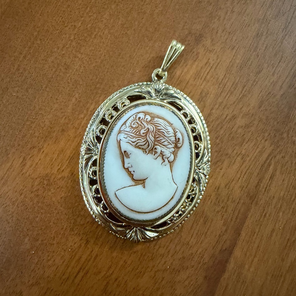 Elegant Gold and Cream Cameo Pendant